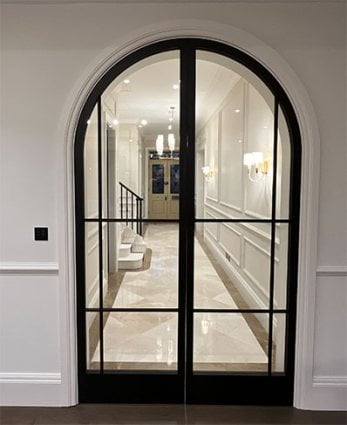 Steel arched french door