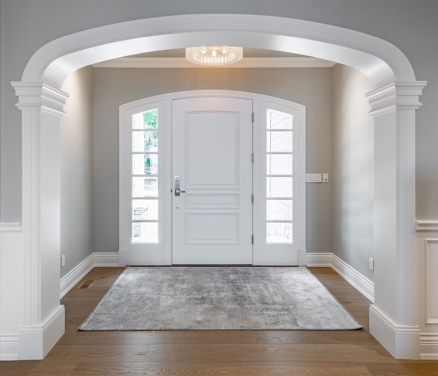 bespoke arched timber white front door set with sidelights