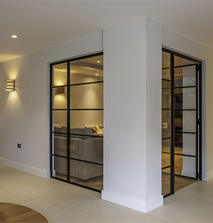 Crittall style steel glass partition and a single door
