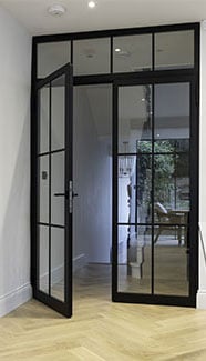 Steel double door with a toplight
